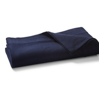 A soft, lofty and warm solid wool blanket with four rows of channel stitch detail at the hem. A soft, lofty and warm solid wool blanket with four rows of channel stitch detail at the hem.