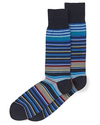 Brilliantly colorful stripes run across these playful Paul Smith socks, adding some vibrancy to your everyday attire. Brilliantly colorful stripes run across these playful Paul Smith socks, adding some vibrancy to your everyday attire.