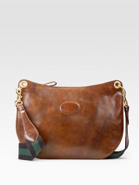 With its removable twill strap, this slim leather design converts from a sporty messenger bag to a sleek portfolio.Removable striped twill shoulder strap, 22 drop Top zip closure One inside zip pocket Two inside open pockets Suede lining 17W X 12H X ¼D Made in Italy With its removable twill strap, this slim leather design converts from a sporty messenger bag to a sleek portfolio.Removable striped twill shoulder strap, 22 drop Top zip closure One inside zip pocket Two inside open pockets Suede lining 17W X 12H X ¼D Made in Italy