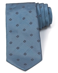 Exquisitely soft silk with a stately pattern of diamonds offers timeless appeal and refined luxury with this classic width tie from Armani Collezioni. Exquisitely soft silk with a stately pattern of diamonds offers timeless appeal and refined luxury with this classic width tie from Armani Collezioni.