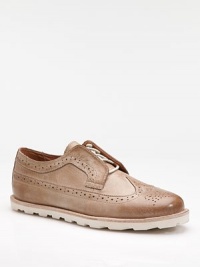 A more casual, easy-wearing fit for the classic wingtip, complete with perforated trim and Goodyear welt soles for added ventilation, strength and comfort. Leather Leather lining Padded insole Goodyear welt rubber sole Imported A more casual, easy-wearing fit for the classic wingtip, complete with perforated trim and Goodyear welt soles for added ventilation, strength and comfort. Leather Leather lining Padded insole Goodyear welt rubber sole Imported