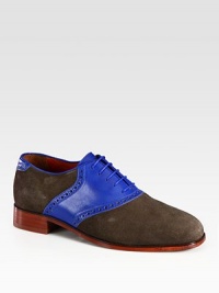 Perforated leather basic with a lace-up front, modernized by smooth, contrasting suede. Suede and leather upperLeather lining and solePadded insoleImported Perforated leather basic with a lace-up front, modernized by smooth, contrasting suede. Suede and leather upperLeather lining and solePadded insoleImported