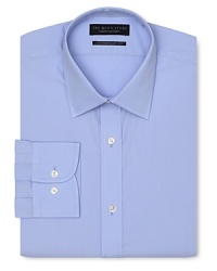 Dress shirt with spread collar, two button barrel cuffs and a contemporary fit through the body, with a solid blue hue. Dress shirt with spread collar, two button barrel cuffs and a contemporary fit through the body, with a solid blue hue.