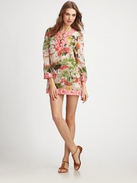 A vibrant coverup offering the best of both worlds: pretty prints and a relaxed-yet-flattering fit.Round neckThree-quarter sleevesButton placketContrast trimPull-on style72% cotton/28% silkDry cleanMade in USA of Italian fabric A vibrant coverup offering the best of both worlds: pretty prints and a relaxed-yet-flattering fit.Round neckThree-quarter sleevesButton placketContrast trimPull-on style72% cotton/28% silkDry cleanMade in USA of Italian fabric