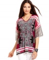 Rhinestones add a glam appeal to this boldly printed petite Alfani tunic -- perfect over leggings or skinny jeans!