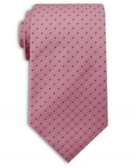 Adding some visual depth to a monochromatic tie, this printed pattern easily complements a solid color button-down shirt. Adding some visual depth to a monochromatic tie, this printed pattern easily complements a solid color button-down shirt.