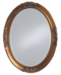 Feel like royalty in the presence of the Queen Ann oval mirror. Elegant flourishes and inner beading dressed in radiant gold leaf grace an antique-inspired frame. Feel like royalty in the presence of the Queen Ann oval mirror. Elegant flourishes and inner beading dressed in radiant gold leaf grace an antique-inspired frame.