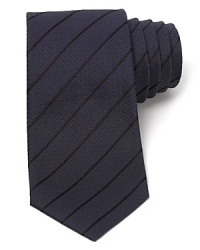 Perfect for a night on the town, this handsome stripe tie is crafted in super-soft Italian silk for just the right touch. Perfect for a night on the town, this handsome stripe tie is crafted in super-soft Italian silk for just the right touch.