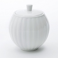 Simple shapes of crisp white are accented with precisely etched lines. Contrasting black matte jasper accessories with glazed interiors are also available. Bone china. Simple shapes of crisp white are accented with precisely etched lines. Contrasting black matte jasper accessories with glazed interiors are also available. Bone china.
