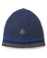 Add this ribbed beanie to your cold weather repertoire for a handsome finish whenever you head outdoors. Add this ribbed beanie to your cold weather repertoire for a handsome finish whenever you head outdoors.
