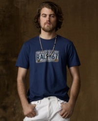Capturing the spirit of adventure that defines Denim & Supply's signature style, a goes-with-everything cotton jersey tee is emboldened with a weathered license plate graphic. Capturing the spirit of adventure that defines Denim & Supply's signature style, a goes-with-everything cotton jersey tee is emboldened with a weathered license plate graphic.