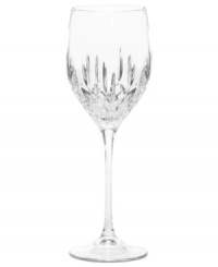 Set a table with enduring appeal. This classically elegant wine glass features intricately cut facets and graceful lines. Wine glass shown second from left.