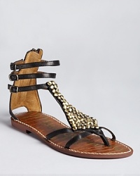 Heavy studs lend edge to Sam Edelman's Ginger sandals, a flat silhouette with enough attitude to go around. Heavy studs lend edge to Sam Edelman's Ginger sandals, a flat silhouette with enough attitude to go around.