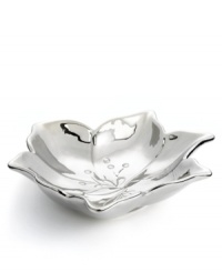 Look to nature for inspiration. Made of sturdy earthenware with an incredible silver glaze, the Lily floral serving bowl from Laurie Gates' collection of serveware and serving dishes creates a beautiful meal out of whatever you're serving. (Clearance) Look to nature for inspiration. Made of sturdy earthenware with an incredible silver glaze, the Lily floral serving bowl from Laurie Gates' collection of serveware and serving dishes creates a beautiful meal out of whatever you're serving. (Clearance)