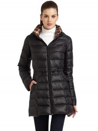 THE LOOKAttached hood with elastic drawstringStand collarLong sleevesFull-zip frontSide slash zippered pocketsElastic drawstring waistbandAnimal-printed liningTHE FITAbout 32 from shoulder to hemTHE MATERIALShell: NylonFill: Down/feathers CARE & ORIGINDry cleanImportedModel shown is 5'10 (177cm) wearing US size Small. THE LOOKAttached hood with elastic drawstringStand collarLong sleevesFull-zip frontSide slash zippered pocketsElastic drawstring waistbandAnimal-printed liningTHE FITAbout 32 from shoulder to hemTHE MATERIALShell: NylonFill: Down/feathers CARE & ORIGINDry cleanImportedModel shown is 5'10 (177cm) wearing US size Small.