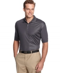 Stay and play dry in this handsome golf shirt by Greg Norman for Tasso Elba. Stay and play dry in this handsome golf shirt by Greg Norman for Tasso Elba.