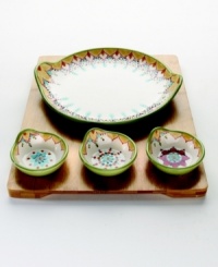 Garnish your party with the sunny botanicals of the Catalina collection from Vida by Eva Mendes dinnerware. The dishes are drenched in soft yellows and tangerine, sky blue and pale green. This hand-painted serveware invites guests to dip and drizzle snacks in three different flavors. A bamboo serving tray keeps everything in its place. Garnish your party with the sunny botanicals of the Catalina collection from Vida by Eva Mendes dinnerware. The dishes are drenched in soft yellows and tangerine, sky blue and pale green. This hand-painted serveware invites guests to dip and drizzle snacks in three different flavors. A bamboo serving tray keeps everything in its place.