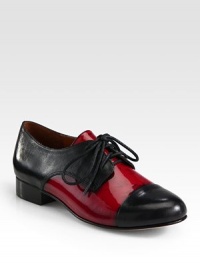 Glossy patent leather in a vibrant tone feminizes this classic leather staple with a stacked heel. Stacked heel, 1 (25mm)Patent leather and leather upperLeather lining and solePadded insoleImported