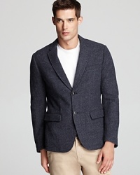 Handsome herringbone always imparts classic sophistication and translates to a variety of venues, making this blazer a reliable wardrobe essential. Handsome herringbone always imparts classic sophistication and translates to a variety of venues, making this blazer a reliable wardrobe essential.