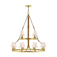 Elegantly rendered in luxurious saddle leather and brass, this modern Ralph Lauren chandelier illuminates through twelve bulbs topped with textural linen shades. Elegantly rendered in luxurious saddle leather and brass, this modern Ralph Lauren chandelier illuminates through twelve bulbs topped with textural linen shades.