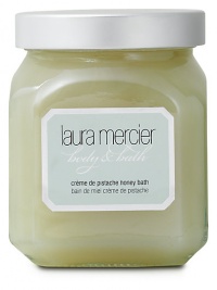 Laura Mercier Crème de Pistache Honey Bath is a decadent, foaming honey moisture bath with natural ingredients that leaves the skin feeling clean, fresh and supple. Vitamins A and E soothe, moisturize and condition the skin. Skin is left with a softly scented veil of fragrance after each use. Laura Mercier Crème de Pistache Honey Bath is a decadent, foaming honey moisture bath with natural ingredients that leaves the skin feeling clean, fresh and supple. Vitamins A and E soothe, moisturize and condition the skin. Skin is left with a softly scented veil of fragrance after each use.