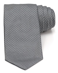 Whether you're speaking at the conference or giving a toast for a friend, this stately tie from Armani Collezioni gives your words an added authority. Whether you're speaking at the conference or giving a toast for a friend, this stately tie from Armani Collezioni gives your words an added authority.