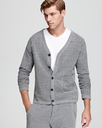 Inspired by a classically masculine cardigan, the Chuck Sweatshirt is embellished with a herringbone print, button front and front pocket. Inspired by a classically masculine cardigan, the Chuck Sweatshirt is embellished with a herringbone print, button front and front pocket.