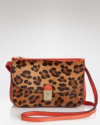 Wildly versatile, this Tory Burch clutch eases into evening. Crafted of calf hair with leather trim, it goes uptown, downtown, and everywhere in between. Wildly versatile, this Tory Burch clutch eases into evening. Crafted of calf hair with leather trim, it goes uptown, downtown, and everywhere in between.