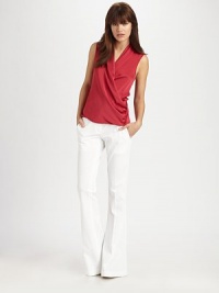 This figure-flattering design is amplified with voluminous flare legs. Front zip closure with button tabDual slash pocketsBesom back pocketsInseam, about 4558% cotton/38% rayon/4% spandexDry cleanMade in USAModel shown is 5'10 (177cm) wearing US size 4. This figure-flattering design is amplified with voluminous flare legs. Front zip closure with button tabDual slash pocketsBesom back pocketsInseam, about 4558% cotton/38% rayon/4% spandexDry cleanMade in USAModel shown is 5'10 (177cm) wearing US size 4.