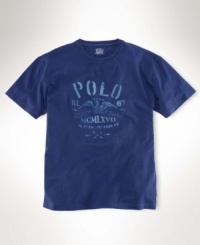 A classic-fitting cotton T-shirt with a printed vintage-inspired graphic offers superior comfort and a timeless look. A classic-fitting cotton T-shirt with a printed vintage-inspired graphic offers superior comfort and a timeless look.