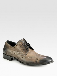 Timeless wingtip style, expertly crafted in Italy from distressed leather for an authentic, vintage-inspired look.Leather upperLeather liningPadded insoleLeather soleMade in Italy Timeless wingtip style, expertly crafted in Italy from distressed leather for an authentic, vintage-inspired look.Leather upperLeather liningPadded insoleLeather soleMade in Italy