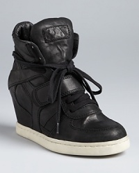Ash has the cool kicks down: this leather sneaker wedge is just edgy enough, with all the right '80s details. Ash has the cool kicks down: this leather sneaker wedge is just edgy enough, with all the right '80s details.
