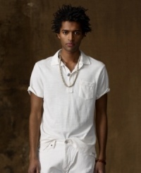 An iconic polo design is created in a soft slub mesh construction and heavily washed, making the perpetually preppy basic more rugged than ever. An iconic polo design is created in a soft slub mesh construction and heavily washed, making the perpetually preppy basic more rugged than ever.