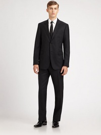 A well-tailored design that exudes modern elegance is shaped in superior Italian wool. Dry Clean. Made in Italy.JACKETTwo-button frontNotched lapelChest welt, waist flap pocketsSide ventsFour button detail at cuffPANTFlat frontFront slash pocketsUnfinished hem A well-tailored design that exudes modern elegance is shaped in superior Italian wool. Dry Clean. Made in Italy.JACKETTwo-button frontNotched lapelChest welt, waist flap pocketsSide ventsFour button detail at cuffPANTFlat frontFront slash pocketsUnfinished hem