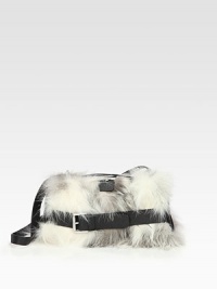 Ultra-luxurious fox fur in a petite, leather accented design.Adjustable shoulder strap, 7½-13 dropTop clasp closureOne inside zip pocketOne inside open pocketSatin lining10W X 5½H X 2DImported