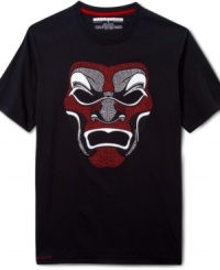 This Sean John tee boasts a unique mask graphic and a comfortable cotton fit. This Sean John tee boasts a unique mask graphic and a comfortable cotton fit.