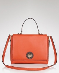 A cute and practical kate spade new york crossbody that styles your look with ladylike flair. Rich leather heightens this accessory, set off with glinting turnlock closure. A cute and practical kate spade new york crossbody that styles your look with ladylike flair. Rich leather heightens this accessory, set off with glinting turnlock closure.