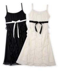 Black and white styling and corkscrew embellishments make this BCX dress totally sweet AND chic! Black and white styling and corkscrew embellishments make this BCX dress totally sweet AND chic!