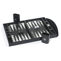 The time-honored game of backgammon gets a stylish new update in this distinguished set by Ralph Lauren Home, crafted from rich leather and polished nickel. The time-honored game of backgammon gets a stylish new update in this distinguished set by Ralph Lauren Home, crafted from rich leather and polished nickel.