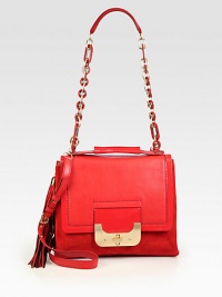 Carry your tech and essentials in style with this luxurious leather and suede design.Top handle, 1¼ dropTop chain and leather handle, 13 drop Detachable adjustable shoulder strap, 20½-25 dropTurnlock flap closureOne outside open pocketOne pocket for iPad®One inside zip pocketTwo inside open pocketsOne pen holderFully lined13W X 9H X 2½DImported Carry your tech and essentials in style with this luxurious leather and suede design.Top handle, 1¼ dropTop chain and leather handle, 13 drop Detachable adjustable shoulder strap, 20½-25 dropTurnlock flap closureOne outside open pocketOne pocket for iPad®One inside zip pocketTwo inside open pocketsOne pen holderFully lined13W X 9H X 2½DImported