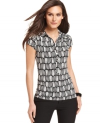 Alfani puts a stylish spin on the polo shirt with this vibrantly printed petite version. Perfect for the office with a polished pant. Alfani puts a stylish spin on the polo shirt with this vibrantly printed petite version. Perfect for the office with a polished pant.