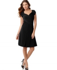 This sweet petite B-Slim dress from Elementz features a flattering criss-cross front and a slimming lining to create a smooth silhouette. This sweet petite B-Slim dress from Elementz features a flattering criss-cross front and a slimming lining to create a smooth silhouette.