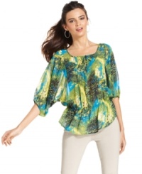 Bold mixed prints, delicate dolman sleeves and a trendy peplum waist take Alfani's petite peasant top to the next level in style! Pair with a variety of skirts, pants and jeans for a stunning outfit. Bold mixed prints, delicate dolman sleeves and a trendy peplum waist take Alfani's petite peasant top to the next level in style! Pair with a variety of skirts, pants and jeans for a stunning outfit.