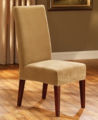 Made of soft, waffle-textured memory stretch fabric, the Stretch Pique slipcover from Sure Fit perfectly form-fits your dining room chair for a designer look. Made of soft, waffle-textured memory stretch fabric, the Stretch Pique slipcover from Sure Fit perfectly form-fits your dining room chair for a designer look.