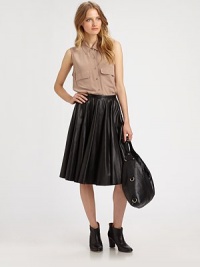 Lustrous leather artfully executed in allover pleats and an a-line silhouette. Invisible back zipperCotton liningAbout 24 longDyed lambskin leatherDry clean with leather specialistImportedModel shown is 5'10 (177cm) wearing US size 2. Lustrous leather artfully executed in allover pleats and an a-line silhouette. Invisible back zipperCotton liningAbout 24 longDyed lambskin leatherDry clean with leather specialistImportedModel shown is 5'10 (177cm) wearing US size 2.