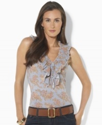 A vibrant pattern and delicate ruffles enliven this sleeveless petite V-neck top from Lauren by Ralph Lauren, crafted from soft cotton jersey. A vibrant pattern and delicate ruffles enliven this sleeveless petite V-neck top from Lauren by Ralph Lauren, crafted from soft cotton jersey.