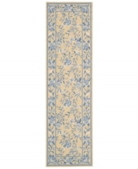 Attractive floral images make this country-style rug a delightful addition to any room. Woven from plush wool, the Country Heritage rug features a muted yellow field, speckled with beautiful blues and whites. Attractive floral images make this country-style rug a delightful addition to any room. Woven from plush wool, the Country Heritage rug features a muted yellow field, speckled with beautiful blues and whites.