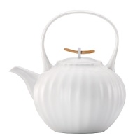 Pure in form, function and feel, each naturally-shaped teapot from Donna Karan beg to be touched. Pure in form, function and feel, each naturally-shaped teapot from Donna Karan beg to be touched.