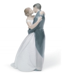 True romance. Handcrafted within glazed porcelain, A Kiss Forever presents the perfect still that evokes a lifetime of joined memories. Couples are sure to cherish this figurine long after they've said, I Do. True romance. Handcrafted within glazed porcelain, A Kiss Forever presents the perfect still that evokes a lifetime of joined memories. Couples are sure to cherish this figurine long after they've said, I Do.