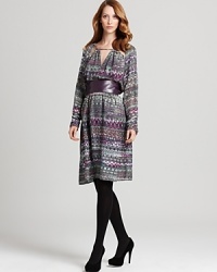 An ikat-inspired print enlivens this sumptuous Anne Klein Collection silk dress, designed with fluid lines and an alluring cutout neckline for a luxe bohemian vibe. An ikat-inspired print enlivens this sumptuous Anne Klein Collection silk dress, designed with fluid lines and an alluring cutout neckline for a luxe bohemian vibe.